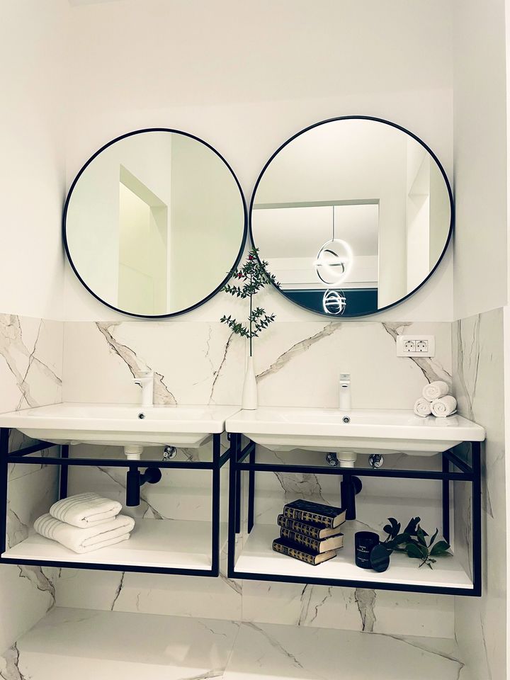double vanity with twin round mirrors, marble